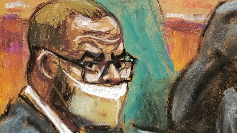 R. Kelly sits with his lawyers Nicole Blank Becker, Devereaux Cannick and Thomas Farinella during Kelly&#39;s sex abuse trial at Brooklyn&#39;s Federal District Court in a courtroom sketch in New York,