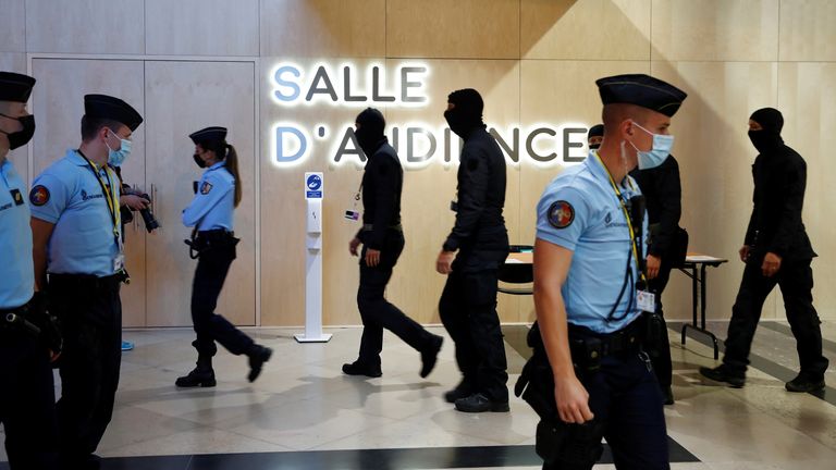 French Gendarmes and police secure outside the temporary courtroom set up at the Paris courthouse on the Ile de la Cite before the start of the trial of the Paris&#39; November 2015 attacks, in Paris, France