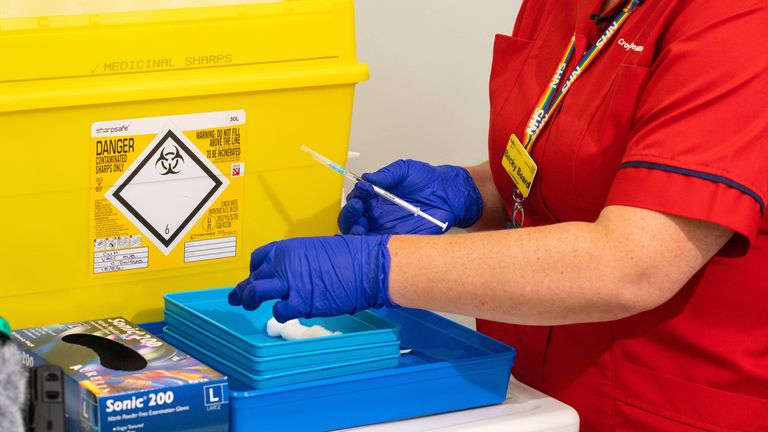 EMBARGOED TO 1300 THURSDAY SEPTEMBER 16 A Covid-19 booster jab being prepared at Croydon University Hospital, south London, as the NHS begins its Covid-19 Booster Vaccination Campaign. Picture date: Thursday September 16, 2021.