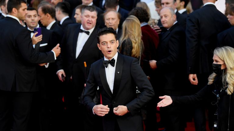 Cast member Rami Malek reacts during the world premiere of the new James Bond film "No Time To Die" at the Royal Albert Hall in London, Britain, September 28, 2021. REUTERS/Toby Melville
