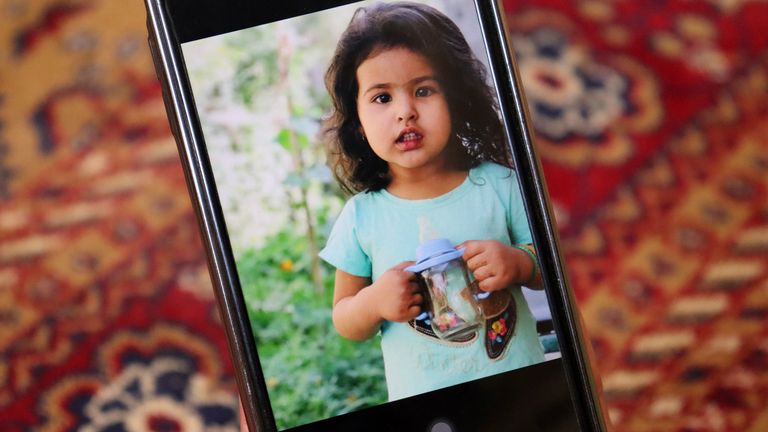 Emal Ahmadi shows a photo of his family member who was killed during a U.S. drone strike on their home last Sunday, , at his home in Kabul, Afghanistan, Thursday, Sept. 2, 2021. Ahmadi says Sunday&#39;s U.S. drone strike killed 10 members of his family, six of them children. Senior U.S. military officials said the drone strike hit an Islamic State target and disrupted the extremist&#39; ability to further disrupt the final phase of the U.S. withdrawal from Afghanistan. (AP Photo/Khwaja Tawfiq Sediqi)


