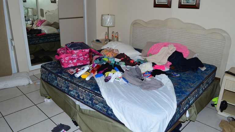  Clothes and toiletries are scattered on a bed in a bedroom of a high-rise condominium where famed drug boss Joaquin "El Chapo" Guzman was arrested, in Mazatlan, Mexico, Saturday Feb. 22, 2014. At the moment of his arrest, Guzman was found with an unidentified woman, said one official not authorized to be quoted by name, adding that the U.S. Drug Enforcement Administration and the Marshals Service were "heavily involved" in the capture. No shots were fired. (AP Photo/El Debate de Mazatla