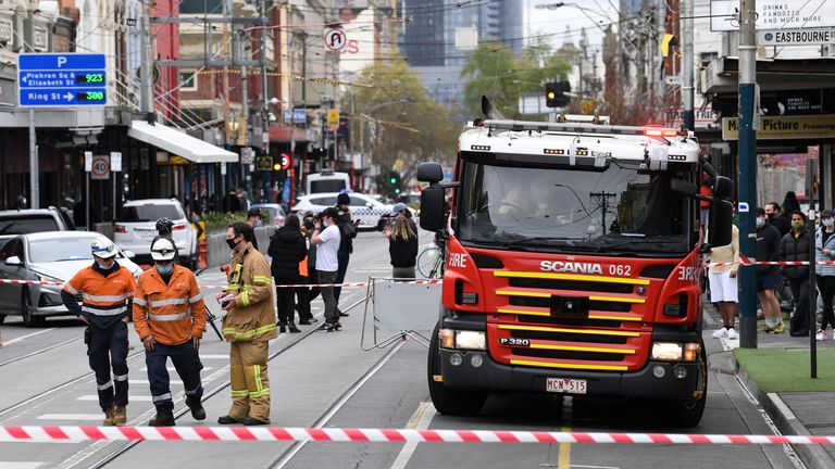 Emergency Services personnel respond to an area that sustained damage from an earthquake in the Windsor suburb of Melbourne, Australia