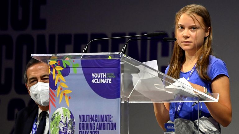 Swedish climate activist Greta Thunberg looks on as she speaks during the Youth4Climate pre-COP26 conference in Milan, Italy, September 28, 2021. REUTERS/Flavio Lo Scalzo
