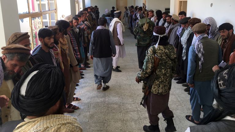 Taliban soldiers stand guard over surrendered Afghan Militiamen in the Kapisa province northeast of Afghanistan, Wednesday, Sept. 8, 2021.   PIC:AP