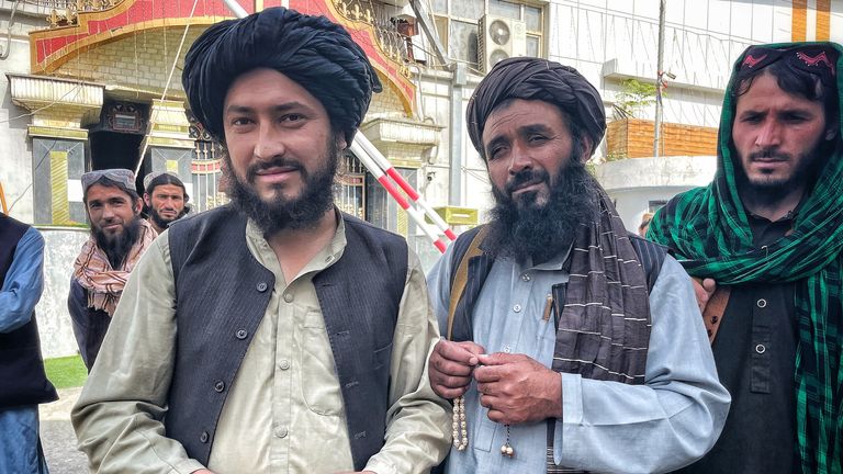 Hafez Sultan Ahmed, left, a deputy Taliban commander