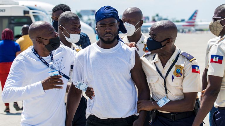 Haitian migrants flown out of Texas arrive in Port-au-Prince, Haiti