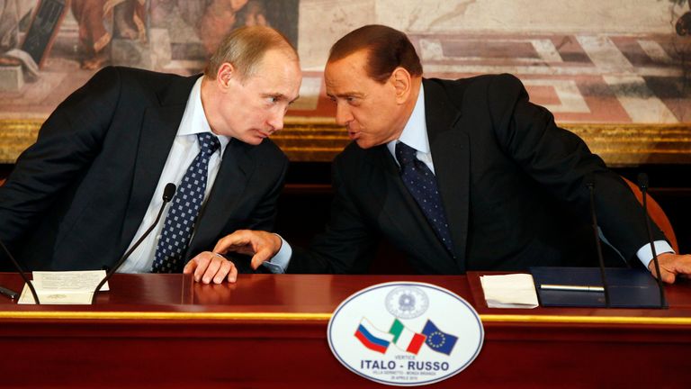 FILE -- In this April 26, 2010 file photo, then Italian Premier Silvio Berlusconi, right, and Russian President Vladimir Putin talk during a press conference at Villa Gernetto, in Gerno, near Milan, Italy
PIC:AP