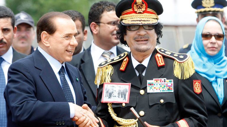 Libyan leader Moammar Gadhafi, right, is greeted by Italian Premier Silvio Berlusconi upon his arrival at Rome&#39;s Ciampino military airport, Wednesday, June 10, 2009. 
PIC:AP