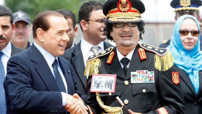 Libyan leader Moammar Gadhafi, right, is greeted by Italian Premier Silvio Berlusconi upon his arrival at Rome&#39;s Ciampino military airport, Wednesday, June 10, 2009. 
PIC:AP