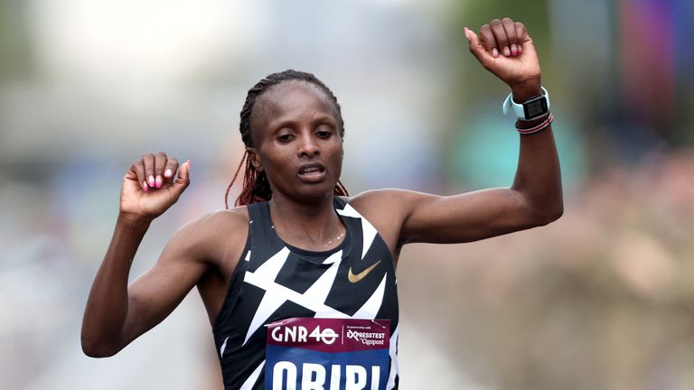 Kenya&#39;s Hellen Obiri celebrates winning the elite women&#39;s race