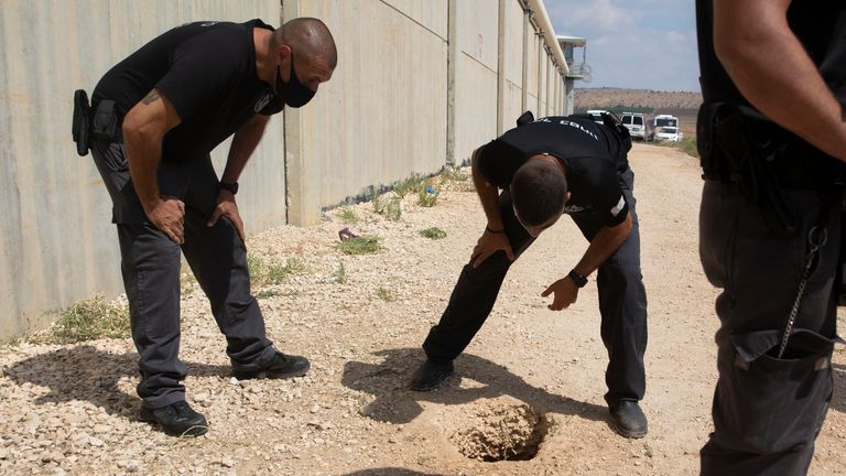 Police officers and prison guards inspect the scene of a prison escape outside the Gilboa prison in Northern Israel, Monday, Sept. 6, 2021. Israeli forces on Monday launched a massive manhunt in northern Israel and the occupied West Bank after six Palestinian prisoners escaped overnight from a high-security facility in an extremely rare breakout.
PIC:AP