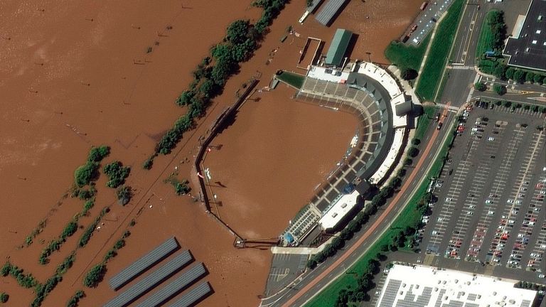 satellite image provided by Maxar Technologies, the stadium for the Somerset Patriots Double-A baseball team is partially flooded by overflow from the Raritan River   NEW JERSEY
PIC:AP/MAXAR