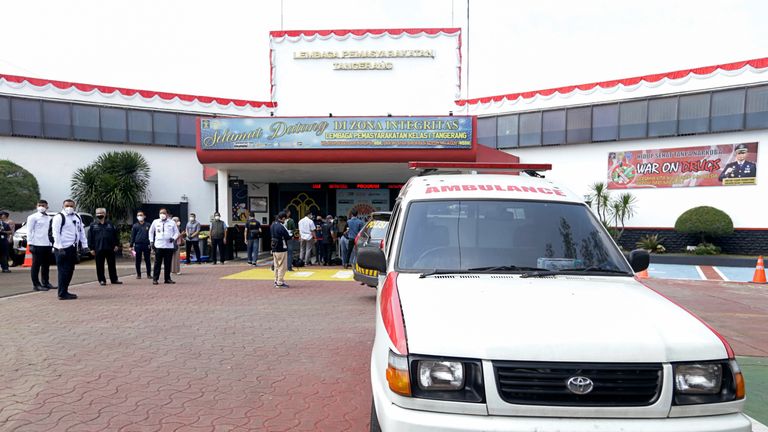 An ambulance is seen at the main entrance gate of the prison