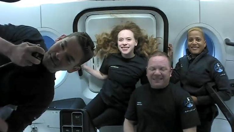 Inspiration4 crew Jared Isaacman, Sian Proctor, Hayley Arceneaux, and Chris Sembroski, seen on their first day in space 