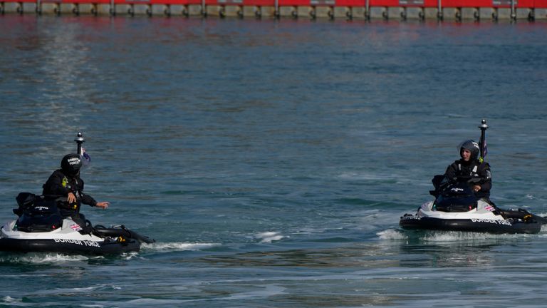 British Border Force officers on jet skis used to intercept small dingy with people thought to be migrants, train in Dover harbour England, Thursday, Sept. 16, 2021. 
PIC:AP