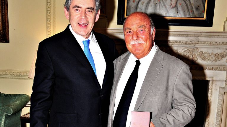 Jimmy Greaves (right) after collecting his medal presented by Prime Minister Gordon Brown (left) for representing his country in the 1966 World Cup
