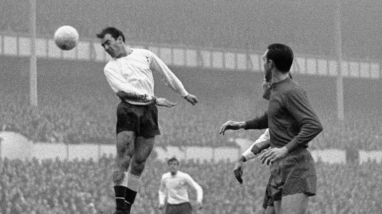 Jimmy Greaves leaps for a ball and scores in Spur's match against West Bromwich at White Heart Lane in December 1966
