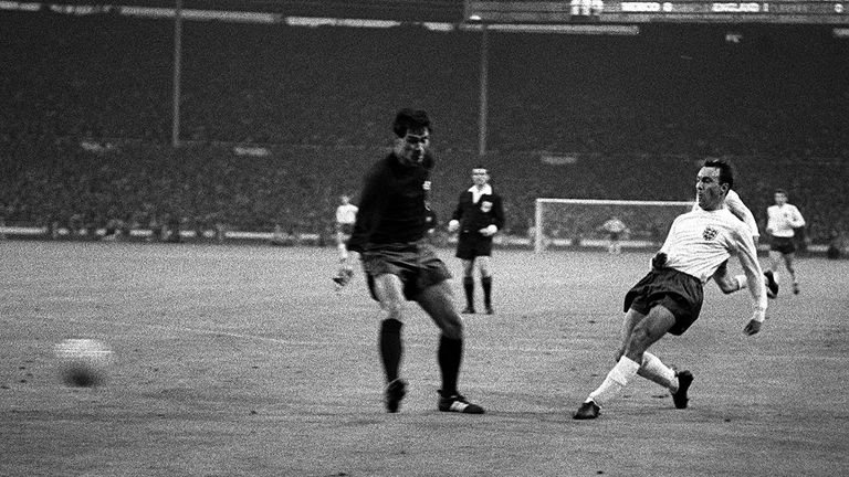 Greaves shoots the ballpast a Mexican defender during the England v Mexico World Cup group match at Wembley Stadium. England won 2-0