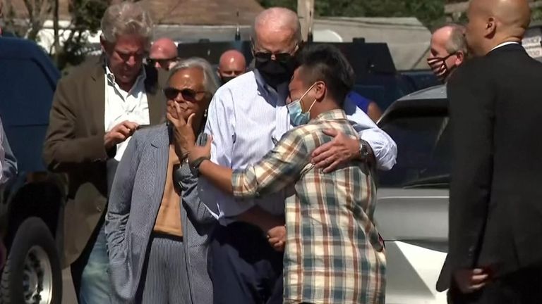 Joe Biden hugs flooding victims