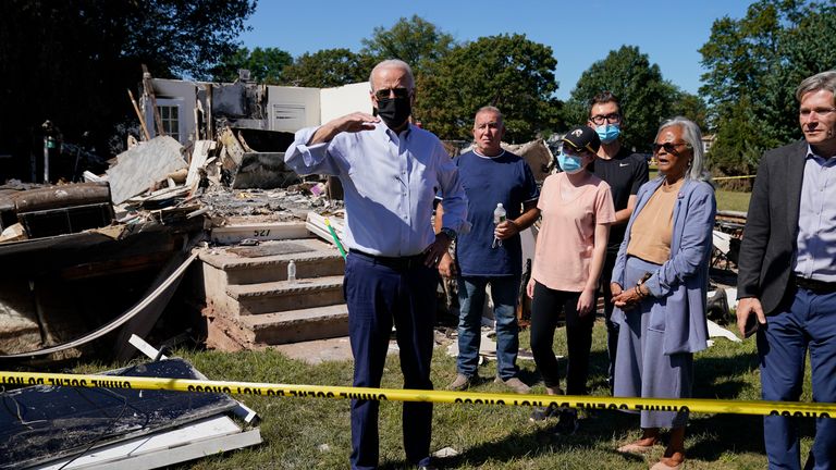 President Joe Biden speaks to members of the media as he tours a neighborhood in Manville, New Jersey impacted by Hurricane Ida. Pic: AP