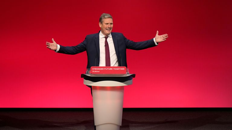 Leader of the British Labour Party Keir Starmer gestures as he arrives to make his keynote speech at the annual party conference in Brighton.