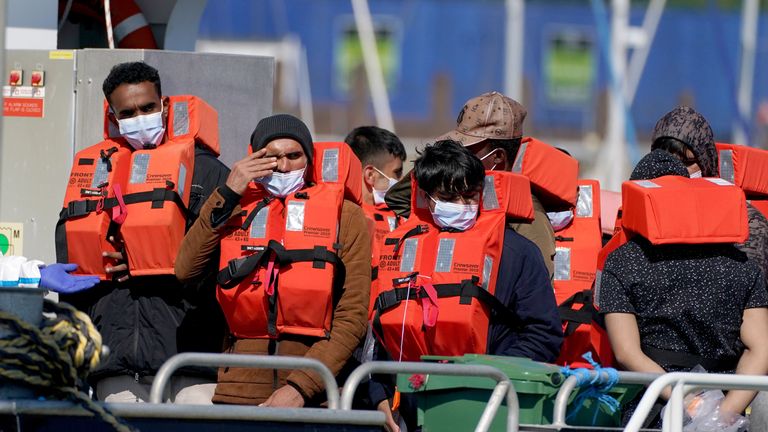 A group of people thought to be migrants are brought in to Dover, Kent, following a small boat incident in the Channel. Picture date: Wednesday September 8, 2021.