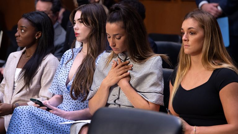 U.S. Olympic gymnasts Simone Biles, McKayla Maroney, Aly Raisman and Maggie Nichols arrive to testify during a Senate Judiciary hearing about the Inspector General's report on the FBI handling of the Larry Nassar investigation of sexual abuse of Olympic gymnasts, on Capitol Hill, in Washington, D.C., U.S., September 15, 2021. Saul Loeb/Pool via REUTERS