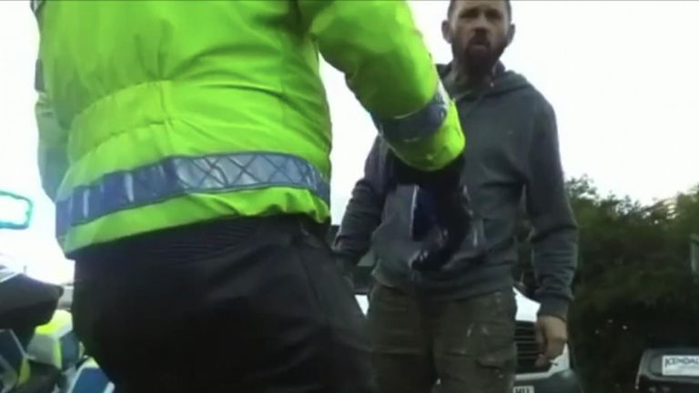 Van Driver Remonstrates With Insulate Britain Protesters Blocking Motorway