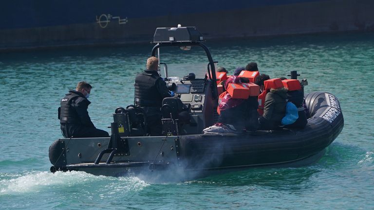 One boat group is brought ashore in a Border Force vessel