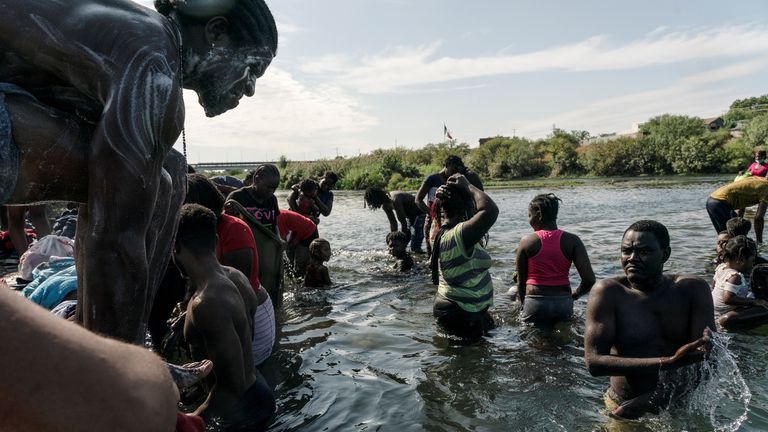 Migrants attempting to seek asylum into the United States are camped on under a bridge on the border of Texas and Mexico