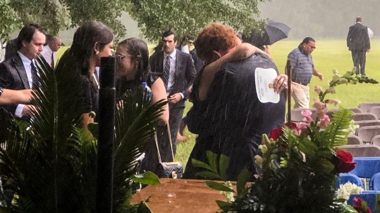 The brother of Paul and Maggie Murdaugh, Buster,  receives a hug at their funeral service on June 11, 2021. Pic: AP