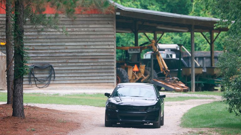 A vehicle sits in the driveway of the home where Paul and Maggie Murdaugh were found shot and killed on the family&#39;s land. Pic: Andrew J. Whitaker/The Post And Courier via AP