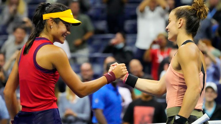 Emma Raducanu of Great Britain (L) shakes hands with Maria Sakkari of Greece (R) after their match on day eleven of the 2021 U.S. Open tennis tournament at USTA Billie Jean King National Tennis Center