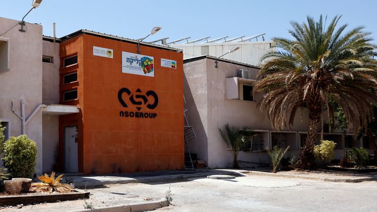 The logo of Israeli cyber firm NSO Group is seen at one of its branches in the Arava Desert, southern Israel July 22, 2021. REUTERS/Amir Cohen
