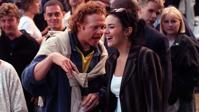 Mick Hucknall and Martine McCutcheon at one of Oasis&#39;s Knebworth gigs