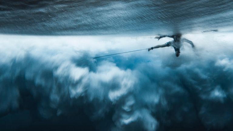 This surfer wipe out was captured from below the surface in Tahiti, French Polynesia. Pic: Ben Thouard/Ocean Photography Awards
