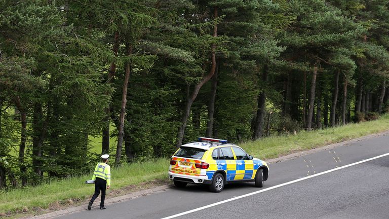 File photo dated 09/07/15 of police officers searching the scene at Junction 9 of the M9 near Stirling where John Yuill and Lamara Bell were discovered. Representatives from Police Scotland will appear at Edinburgh High Court on Tuesday to give evidence in the M9 death crash case. Issue date: Tuesday September 7, 2021.
