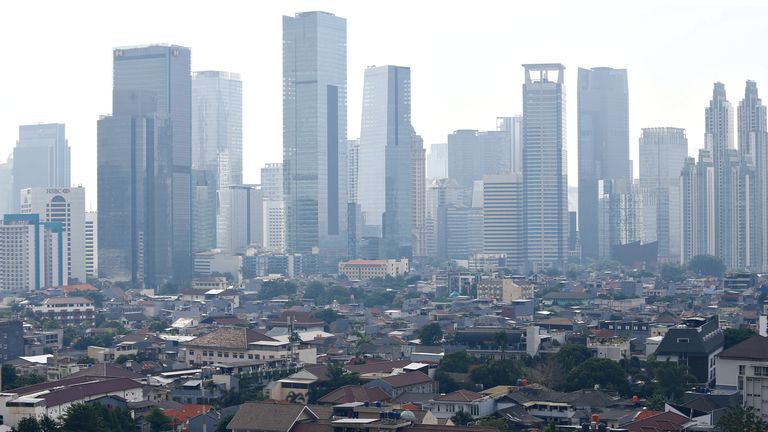 A general view of business buildings as smog covers the capital city of Jakarta, Indonesia, May 19, 2021. REUTERS/Ajeng Dinar Ulfiana