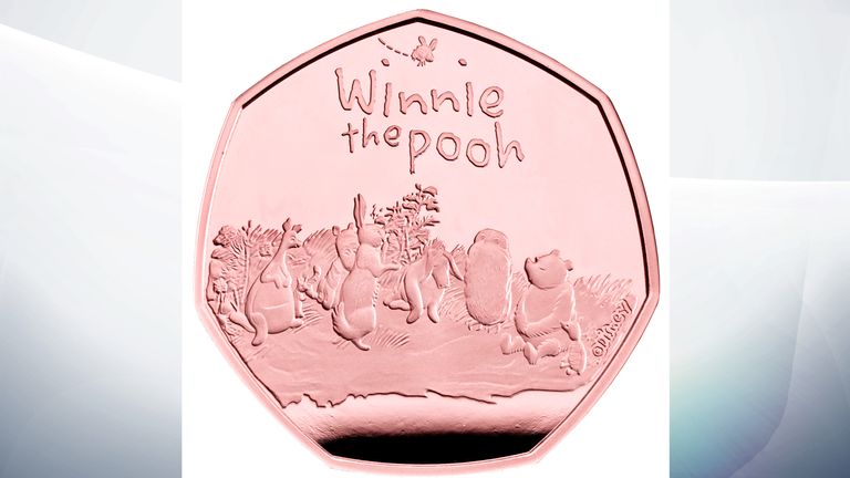 Undated handout photo issued by The Royal Mint of a proof of the obverse of a new gold 50p collectable coin featuring Winnie-the-Pooh and his friends