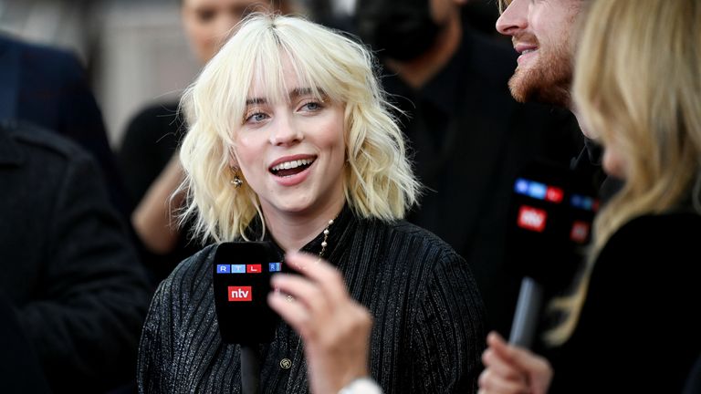 Singer Billie Eilish speaks to the media during the world premiere of the new James Bond film "No Time To Die" at the Royal Albert Hall in London, Britain, September 28, 2021. REUTERS/Toby Melville