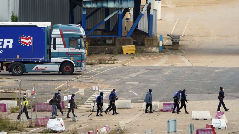 A group of people thought to be migrants are brought in to Ramsgate, Kent, by Border Force officers on 26 September