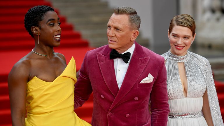Cast members Lashana Lynch, Daniel Craig and Lea Seydoux pose during the world premiere of the new James Bond film "No Time To Die" at the Royal Albert Hall in London, Britain, September 28, 2021. REUTERS/Toby Melville