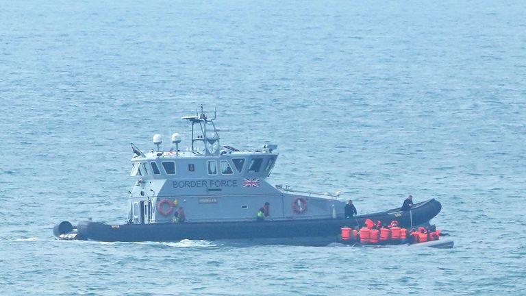 A Border Force vessel intercepts a group of people thought to be migrants in a small boat off the coast of Dover in Kent. Picture date: Friday September 17, 2021.