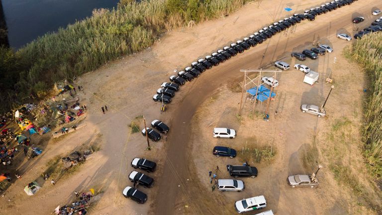 Texas Department of Safety vehicles line up along the bank of the Rio Grande near an encampment of migrants, many from Haiti, near the Del Rio International Bridge, Tuesday, Sept. 21, 2021, in Del Rio, Texas. The U.S. is flying Haitians camped in a Texas border town back to their homeland and blocking others from crossing the border from Mexico. 
PIC:AP