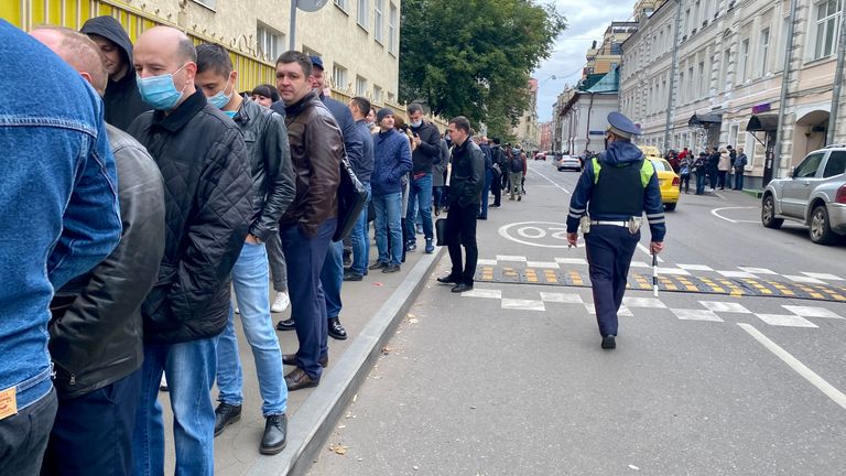 Long queue of people waiting to vote outside polling station at the first day of elections in Russia