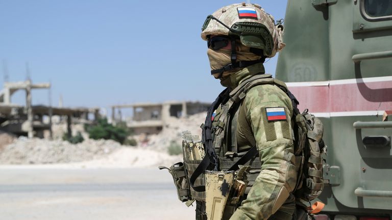 Russia forces, such as this military police officer, remain in parts of Syria