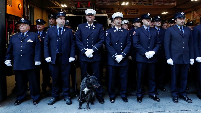 Firefighters attend a ceremony in New York on the 20th anniversary of 9/11