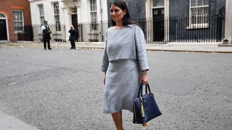 Britain's Home Secretary Priti Patel walks outside Downing Street in London, Britain, September 15, 2021. REUTERS/Hannah McKay