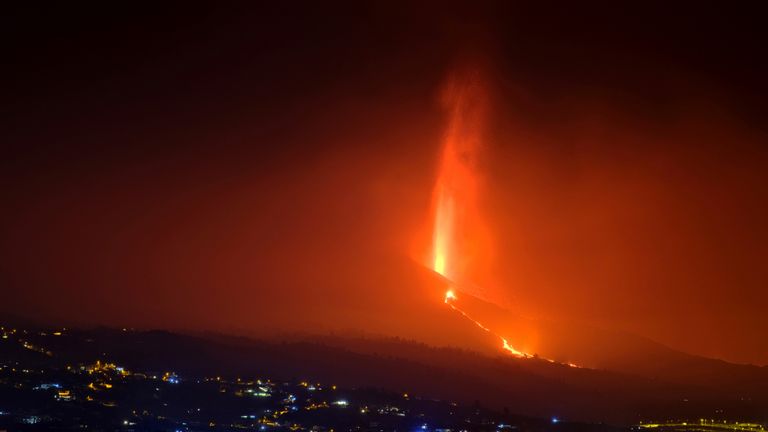 Lava flows from a volcano on the Canary island of La Palma, Spain on Sunday Sept. 26, 2021. A massive cloud of ash prevented flights in and out of the Spanish island of La Palma 
PIC:AP
